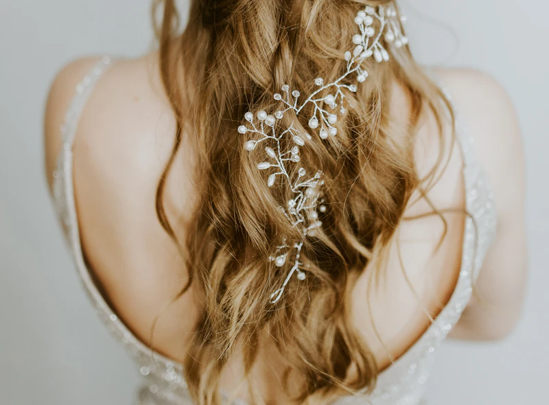 Bridal updo with fresh flowers